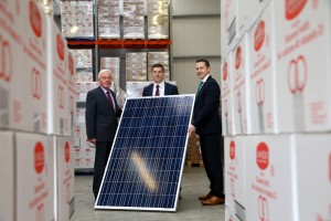 Major Investment Programme Gets Underway at Armagh Bakery / John Woods, (left) Managing Director and Patrick Woods, Sales & Marketing Director, Linwoods are pictured with Mel Courtney, General Manager, UK and Ireland, Kingspan Energy Ltd with a sample of one of the 200 rooftop solar panels which is being installed as part of a £2million development at the companies Armagh site.